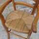 Wooden children's high chair and mulched seat