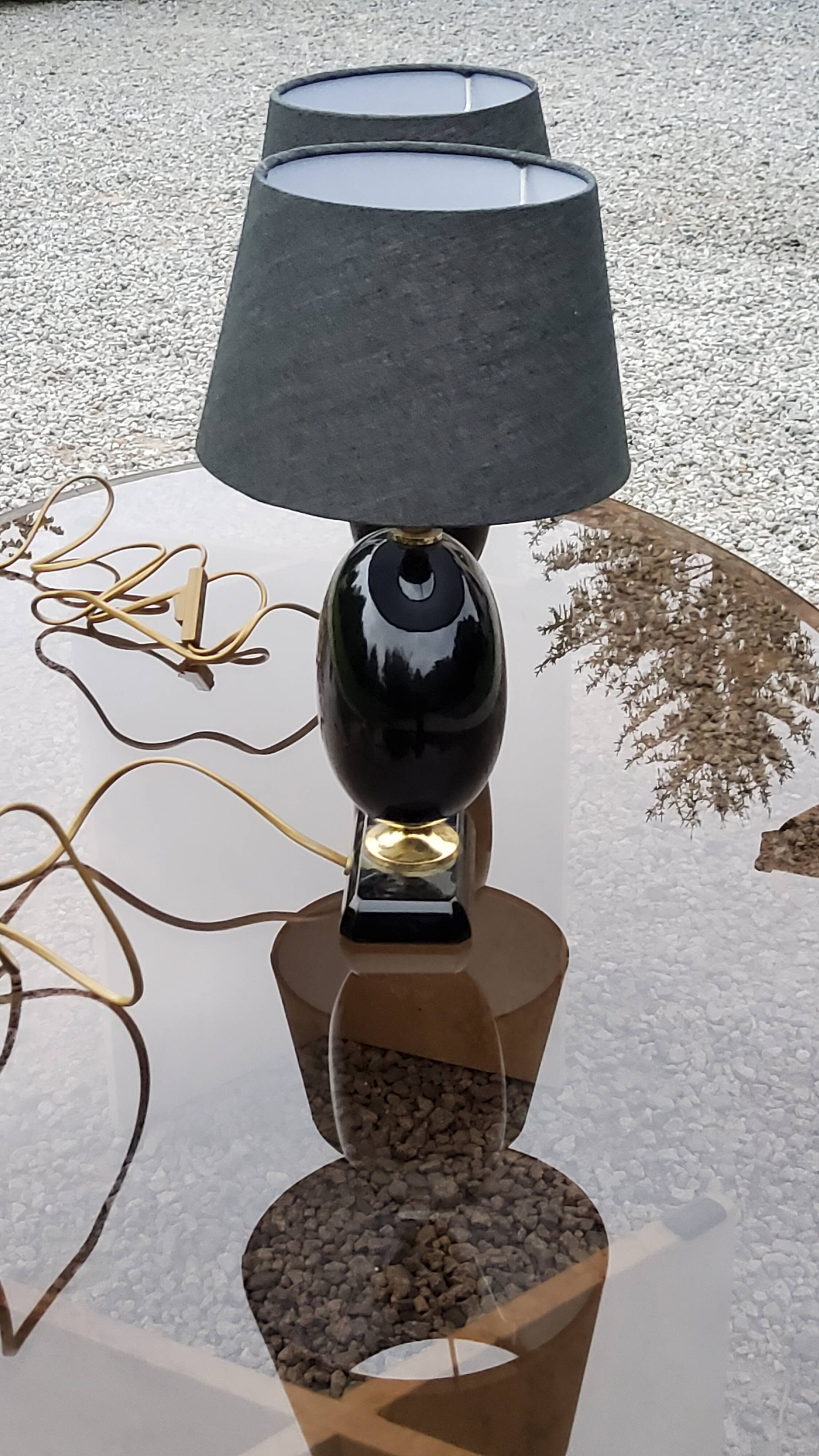 Pair of 70s designer lamps in black ceramic and gold metal