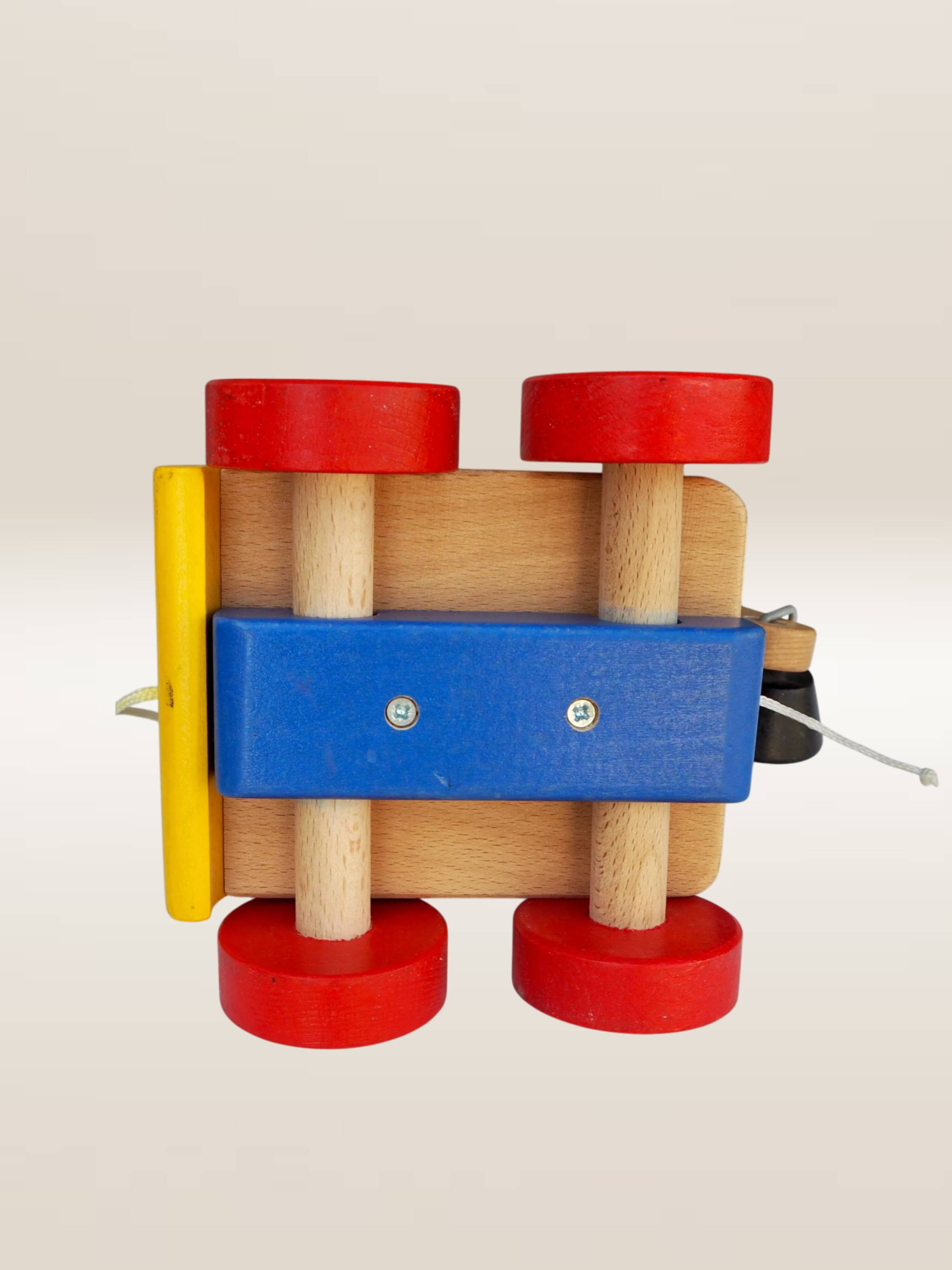 Jouet à tirer camion articulé en bois
