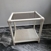 Rattan and cane side table with tinted glass top