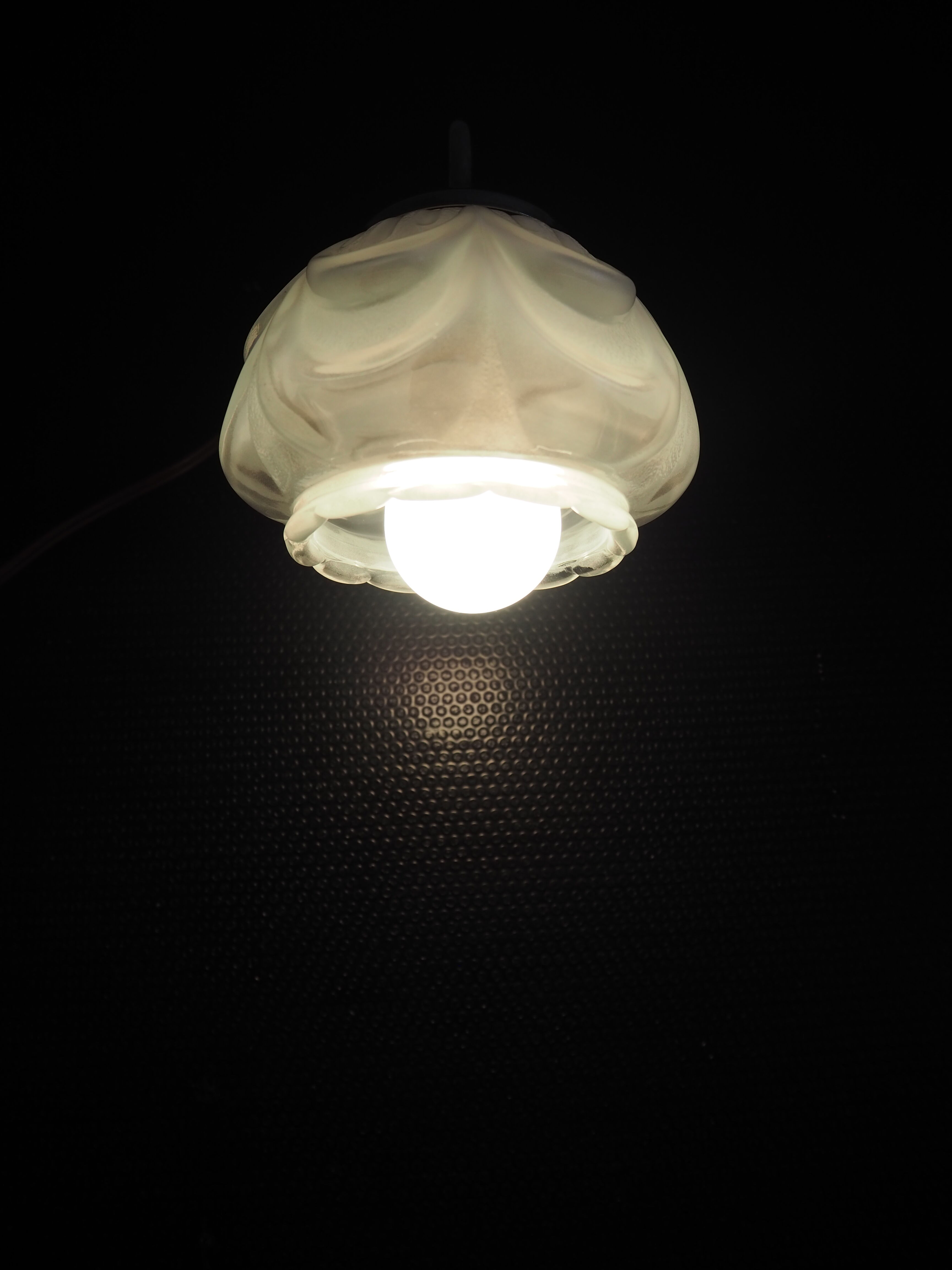 Brass wall lamp and white glass globe from the 1950s-1960s.