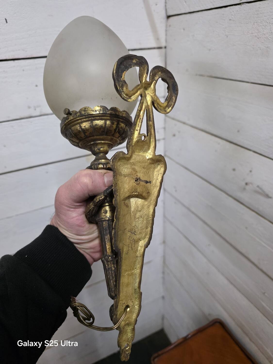 Pair of torch wall lights in Louis XVI style in 19th-century bronze.
