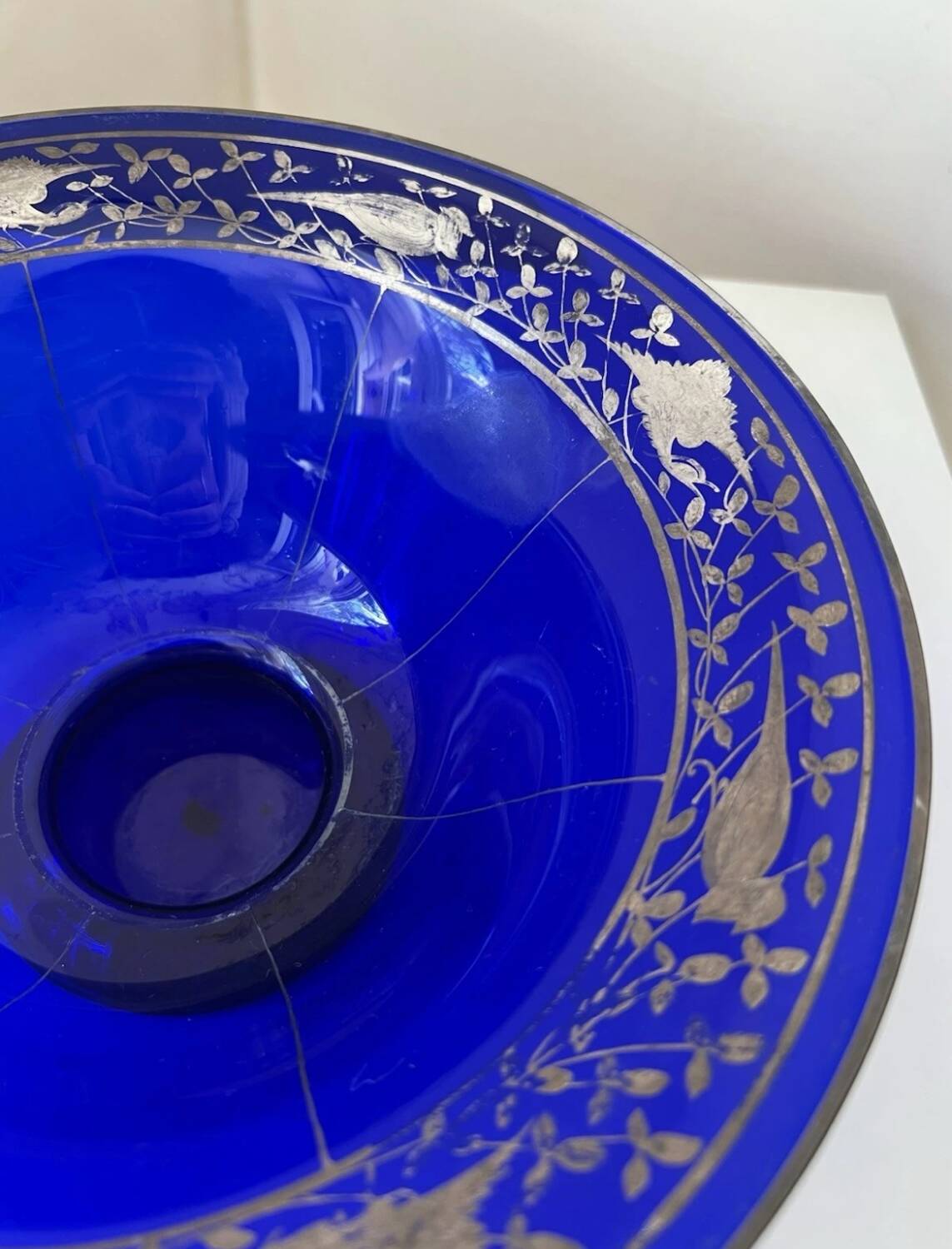 Cobalt blue glass bowl with Art Deco bird decor
