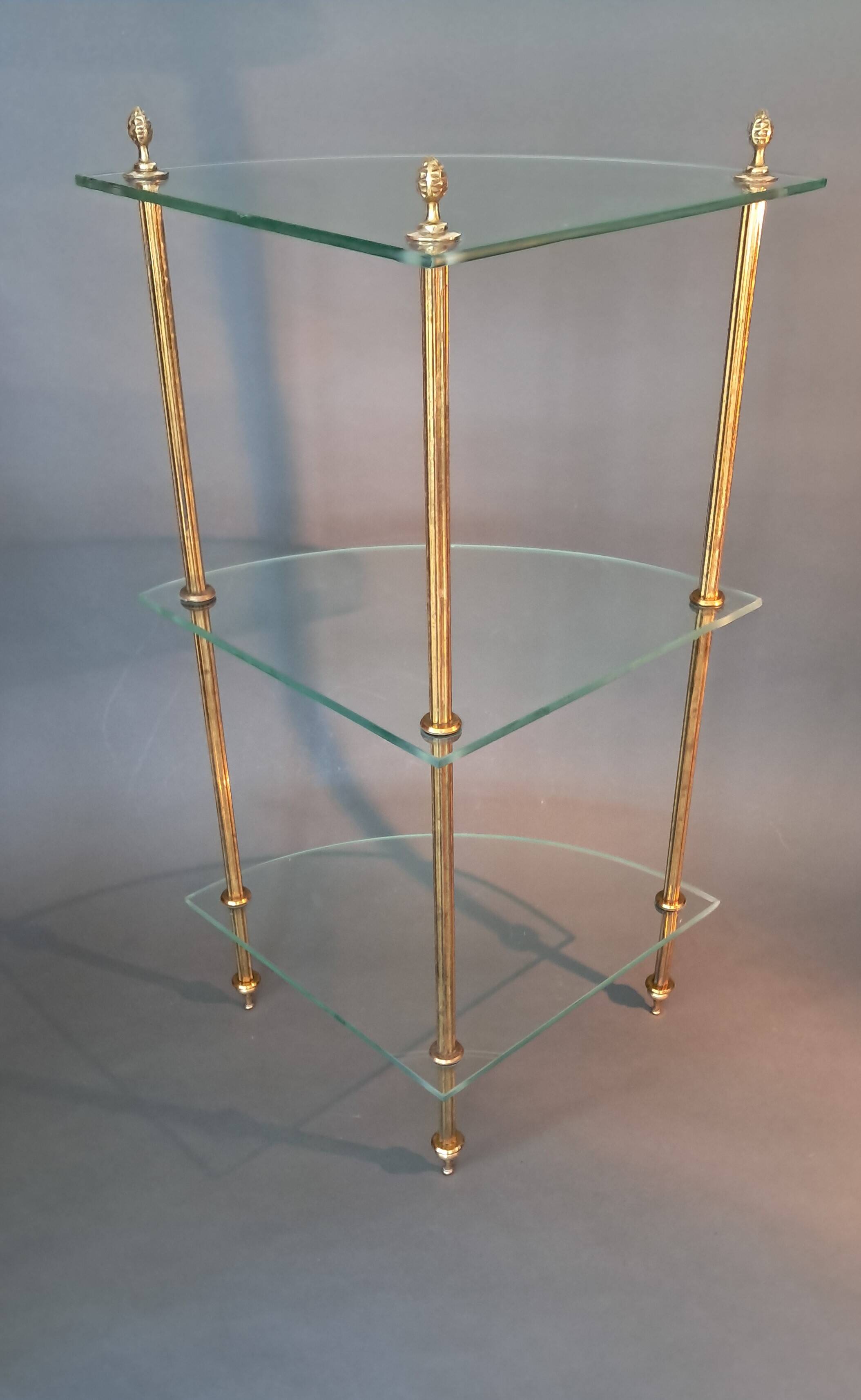 Neoclassical style 3-shelf corner cupboard in gilded brass, Circa 1950/1960.
