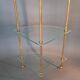 Neoclassical style 3-shelf corner cupboard in gilded brass, Circa 1950/1960.