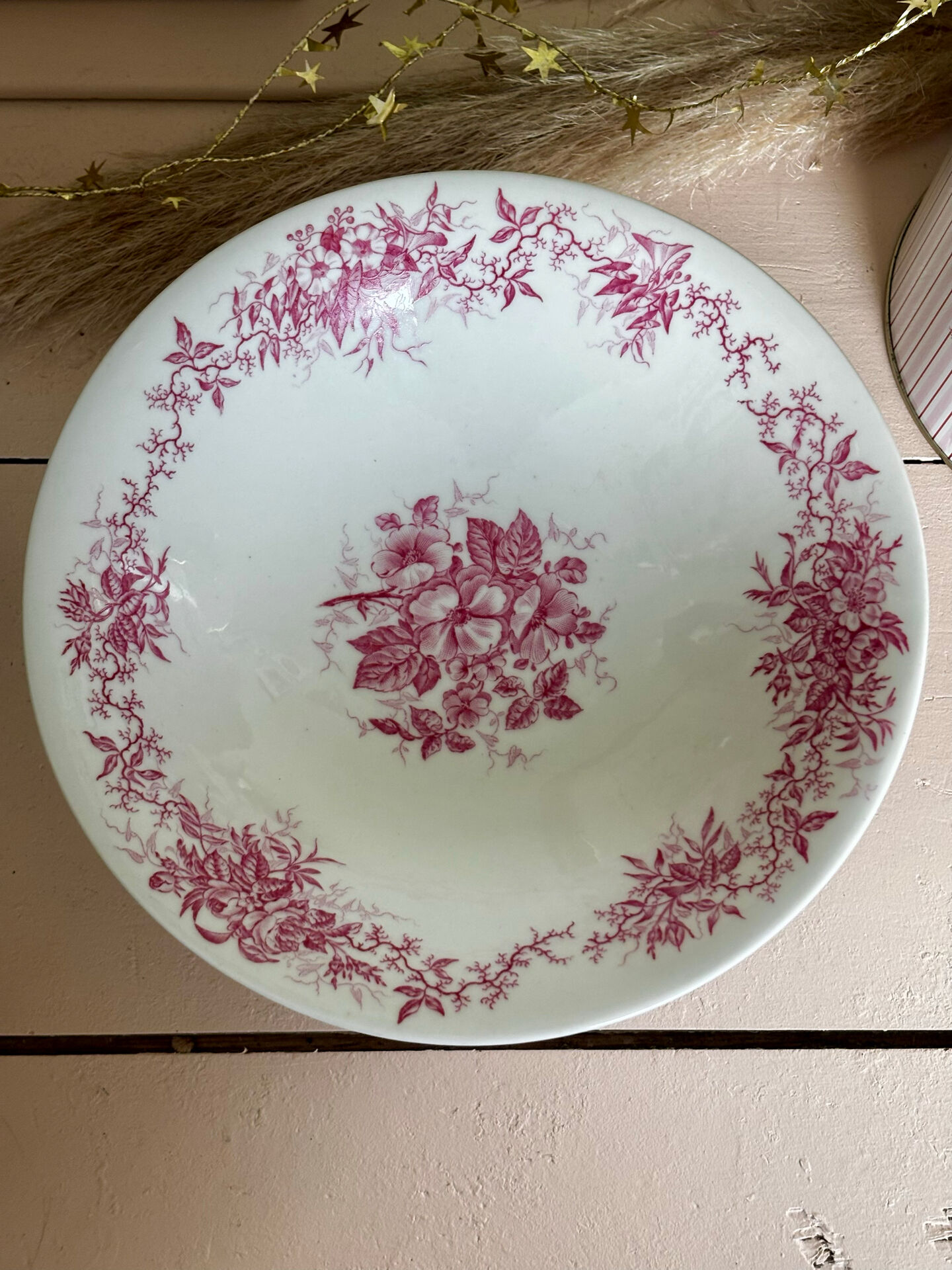 Magnificent antique compote fine porcelain with pink floral decoration.