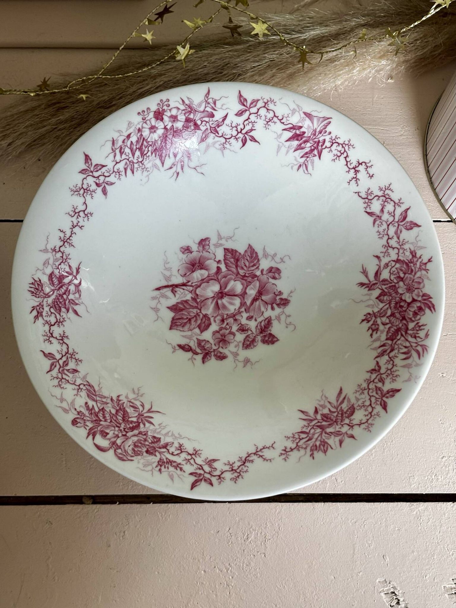 Magnificent antique compote fine porcelain with pink floral decoration.