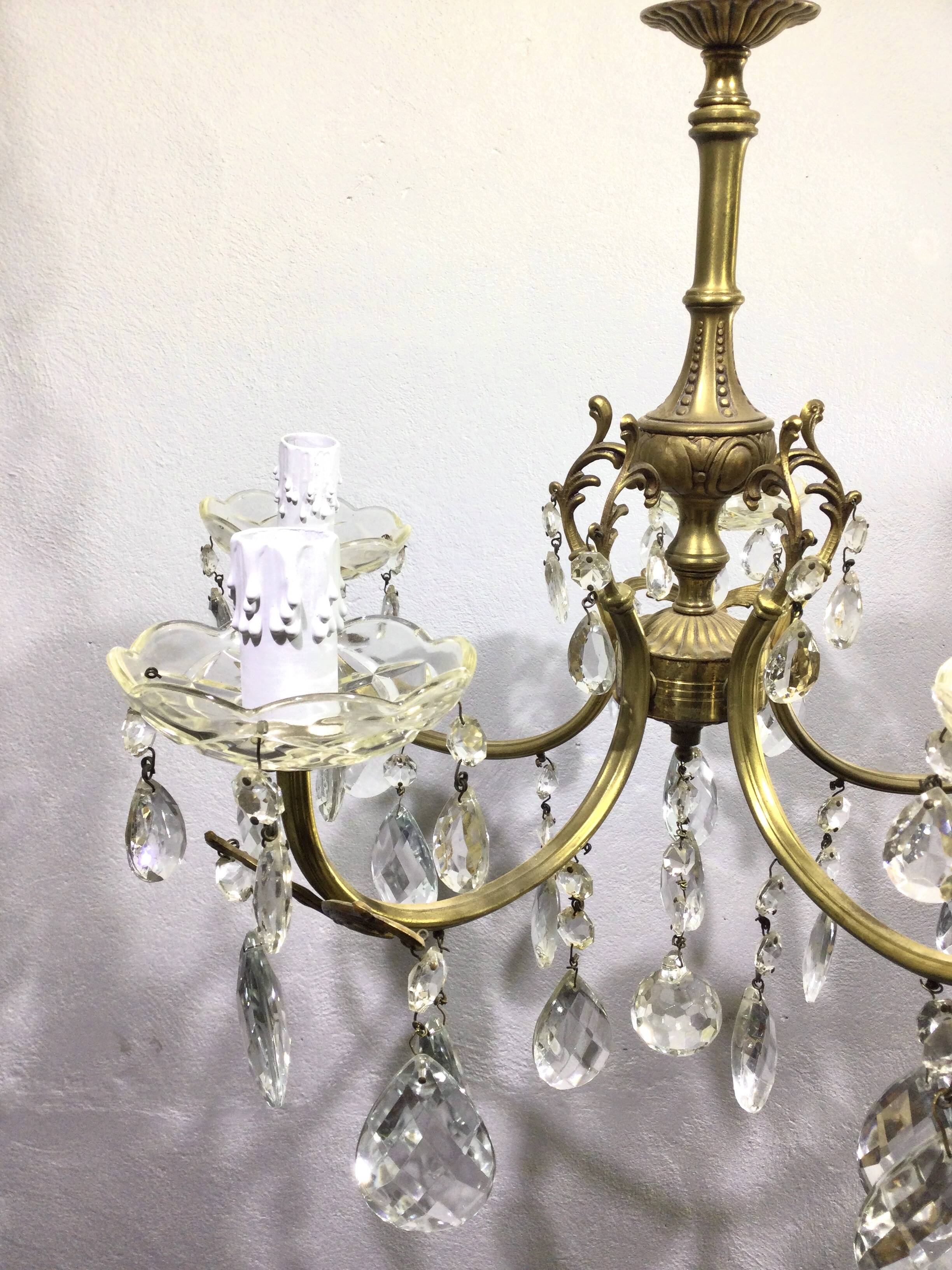 5-light chandelier in brass and tassels