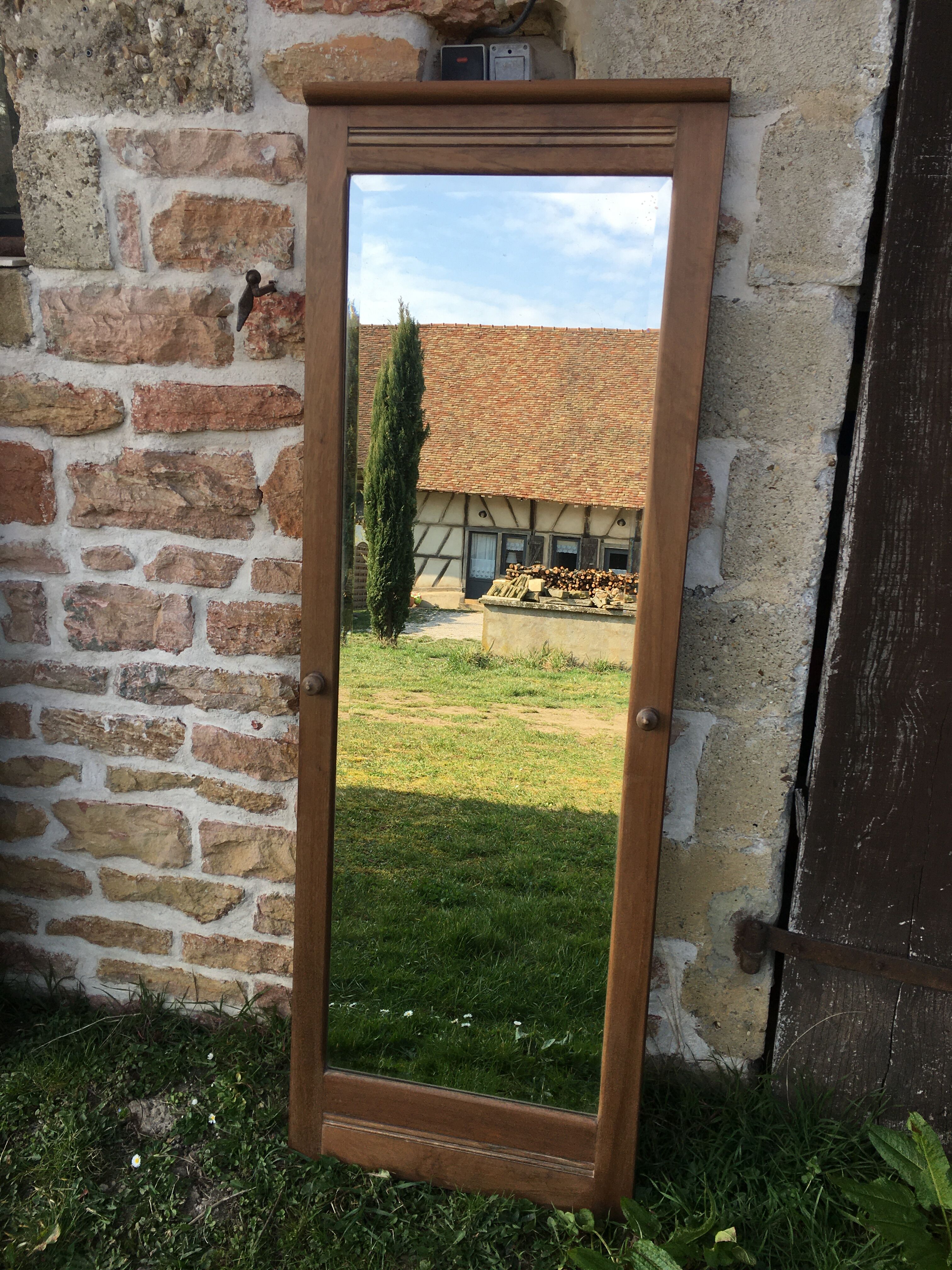 Beveled mirror walnut frame