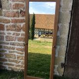Beveled mirror walnut frame