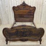 Louis XV style bed in walnut from the 1900s