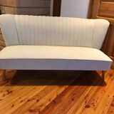 Mid-Century 1950s style two-seater canapé with cream fabric and solid beech.