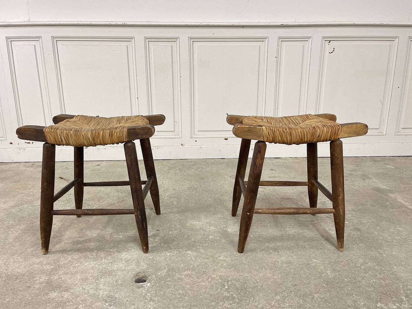 A pair of 1950s straw stools.