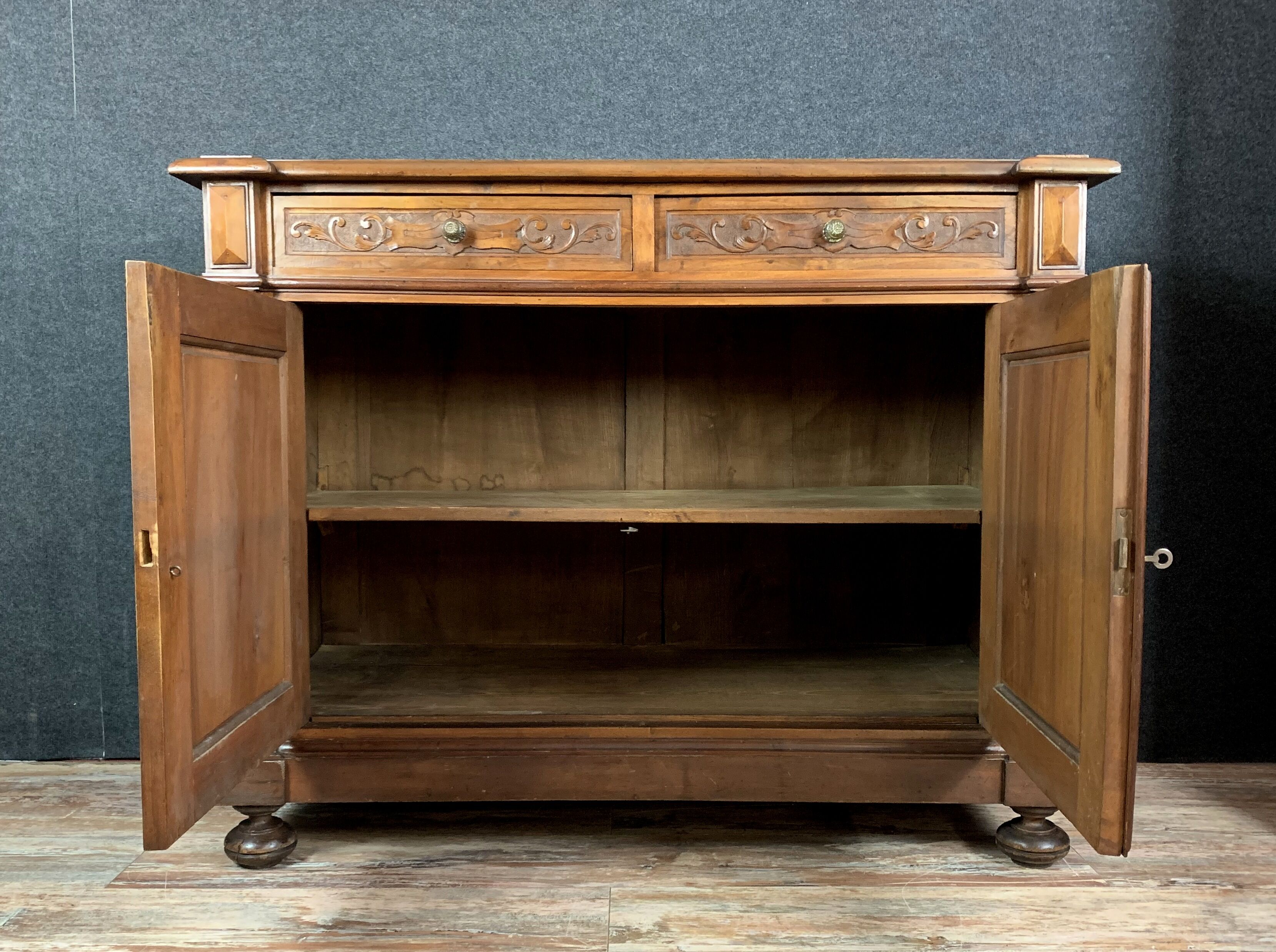 Renaissance walnut buffet has plenty sculpture decorations