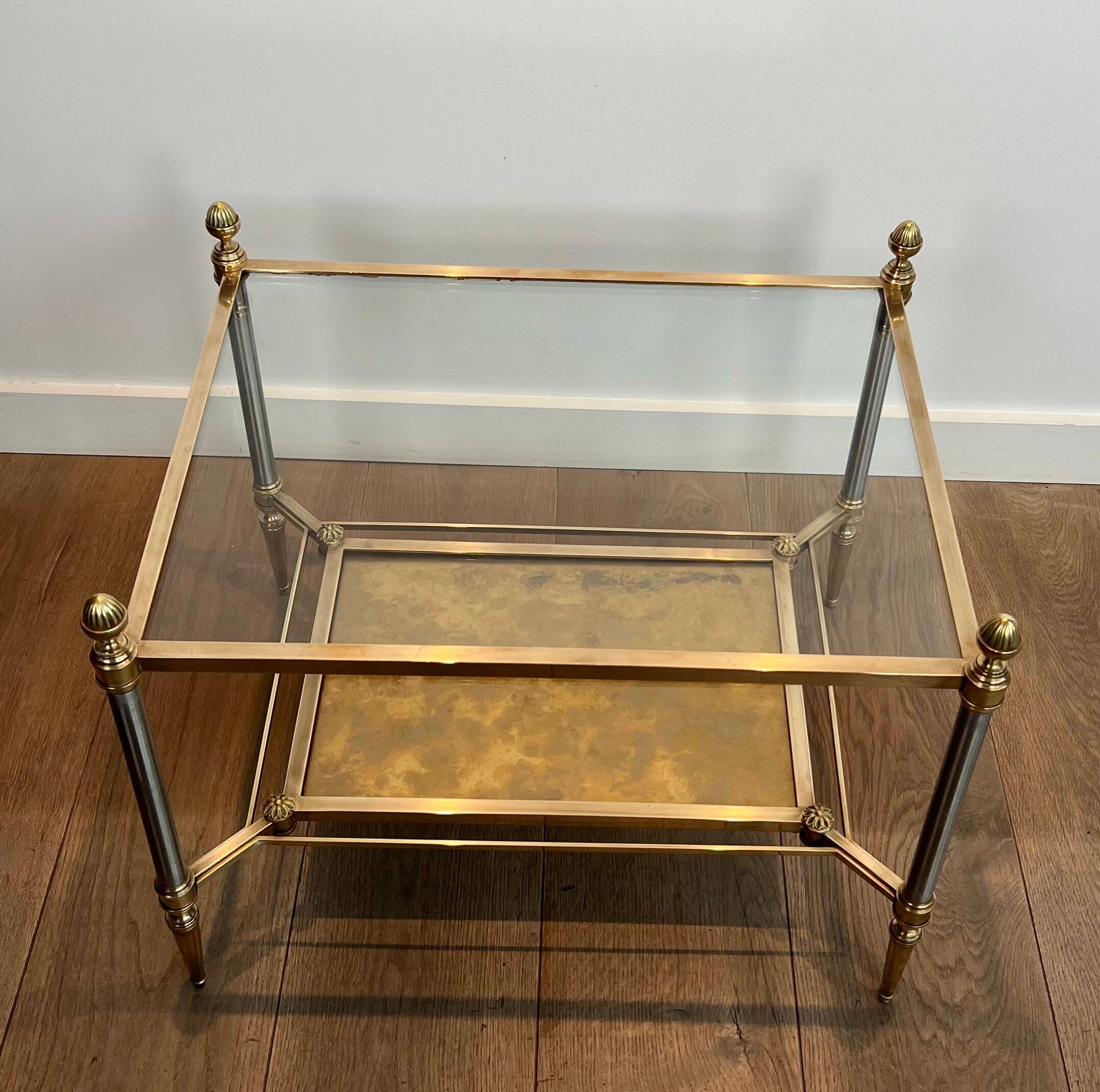 Pair of neoclassical side tables in steel and brass by Maison Jansen.