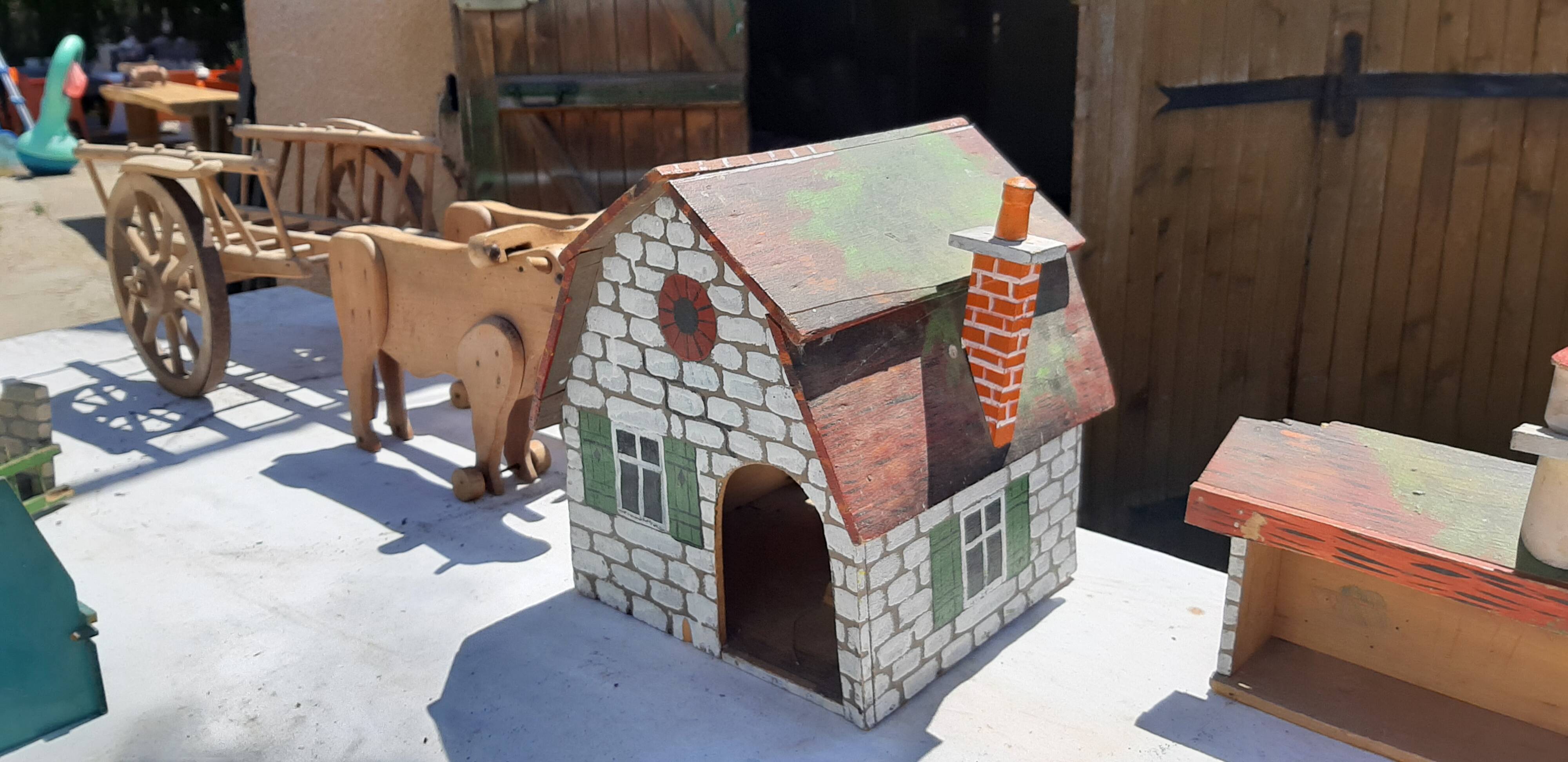Set of old wooden toys from the farm