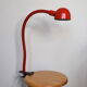 Red articulated clip-on desk lamp vintage