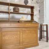 Wooden hardware cabinet painted with wood effect, circa 1940.