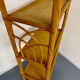 Large woven rattan bookshelf designed in the 1970s.