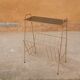 Vintage gold metal magazine rack
