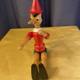 Statuette de pinocchio en bois articule jouet ancien
