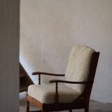 Modern Danish design, a pair of high-backed armchairs in oak and lambswool, 1950s.