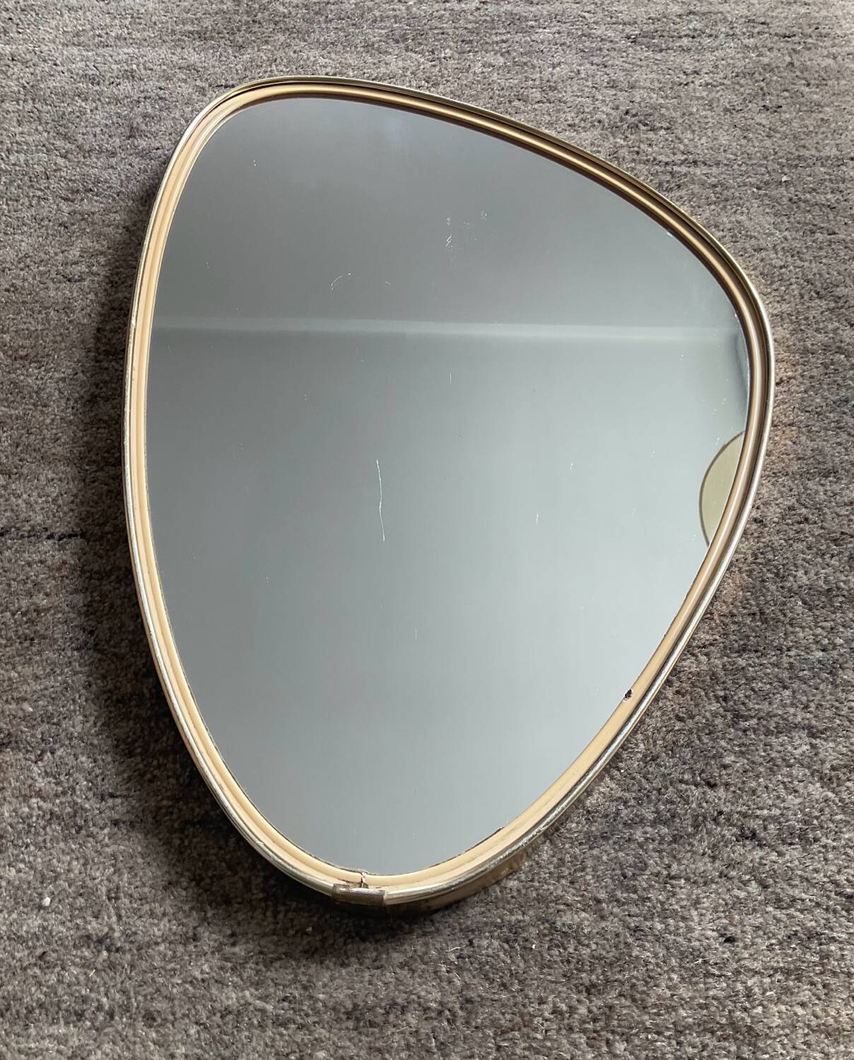 Asymmetrical free-form mirror from the 60s-70s.