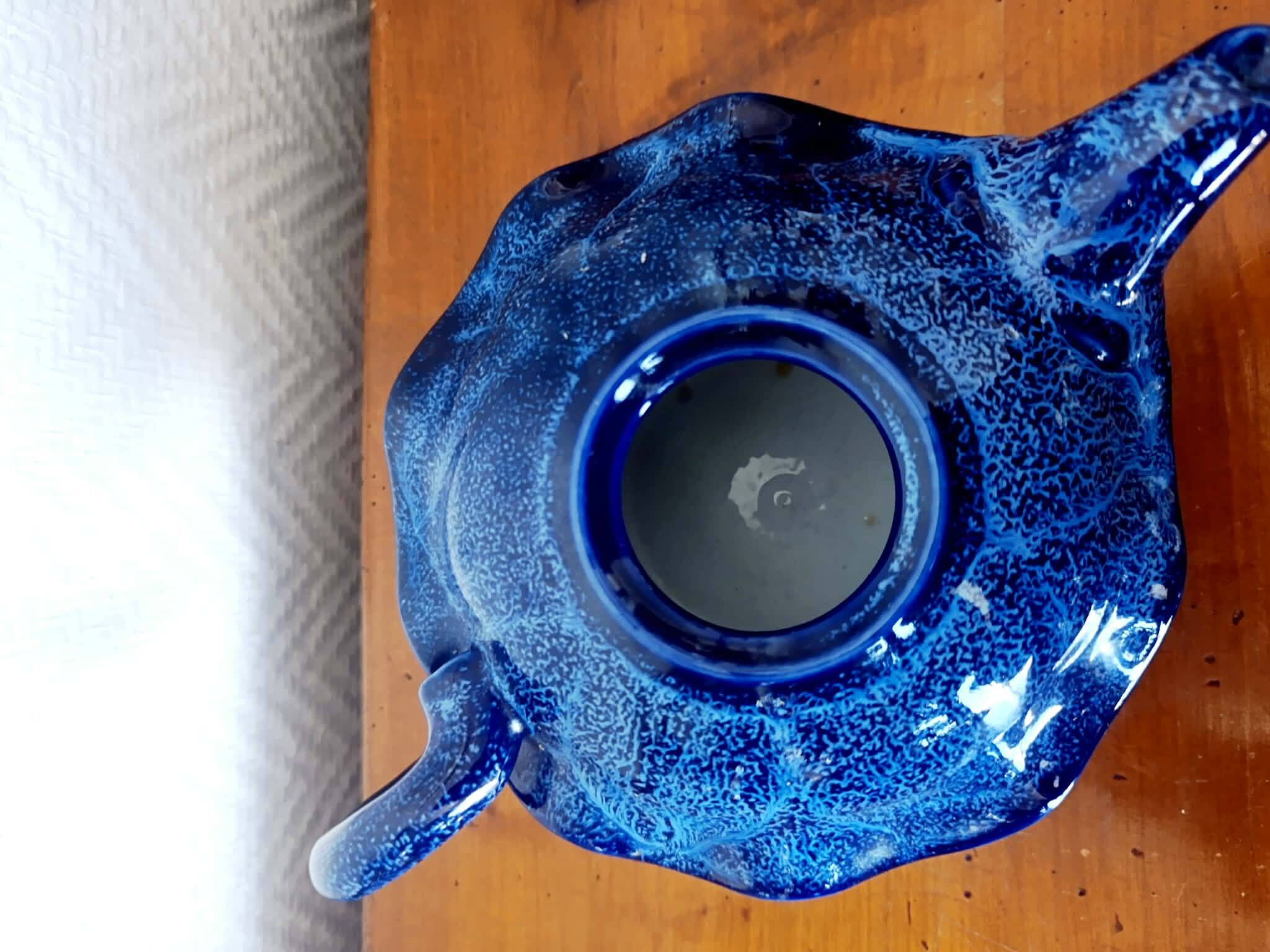 Blue ceramic Art Deco teapot with a frog.