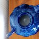 Blue ceramic Art Deco teapot with a frog.