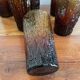 6 orangeade glasses with tree bark