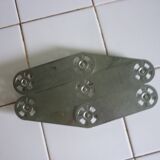 Expandable stainless steel trivet from the 50s and 60s