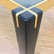 Italian coffee table from the 70s, smoked glass, black and gold lacquered wood.