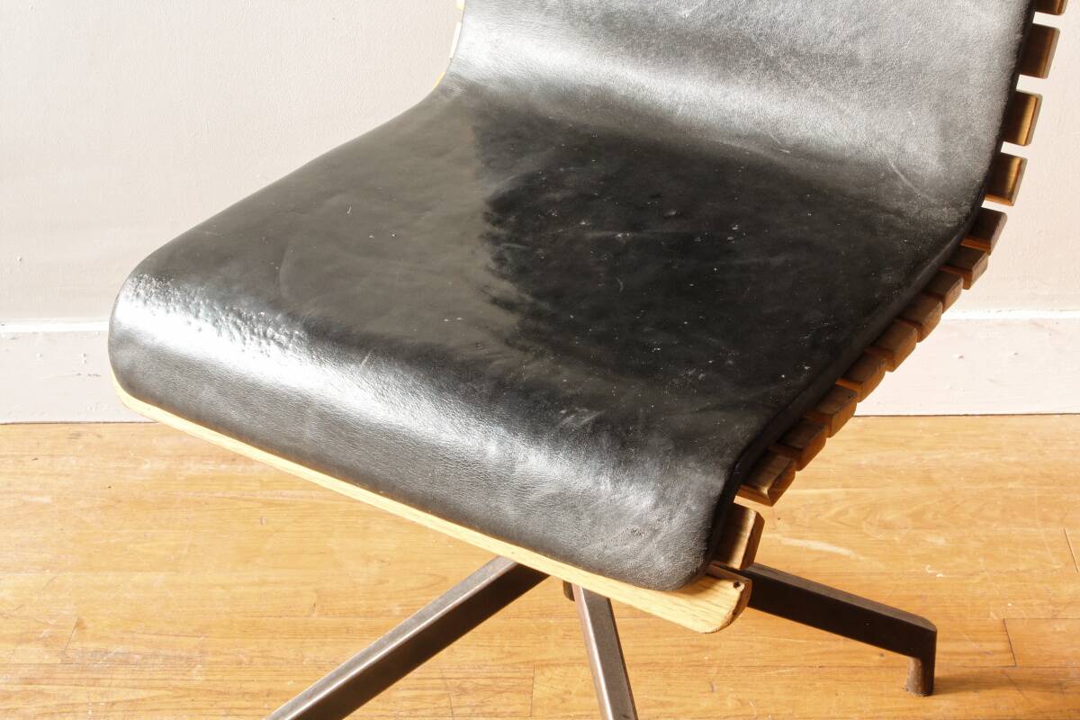 Handcrafted chair, laminated wood and leather