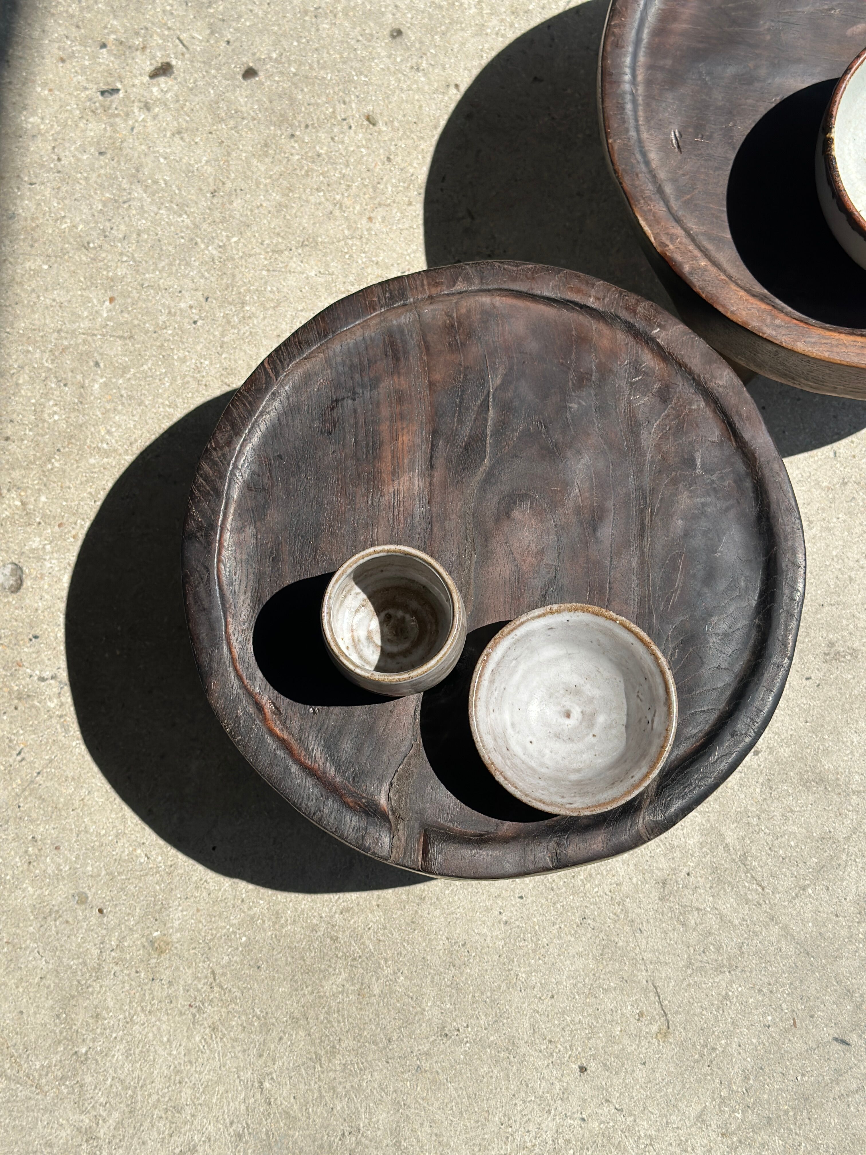 Small tripod stool low in dark brown upcycled teak