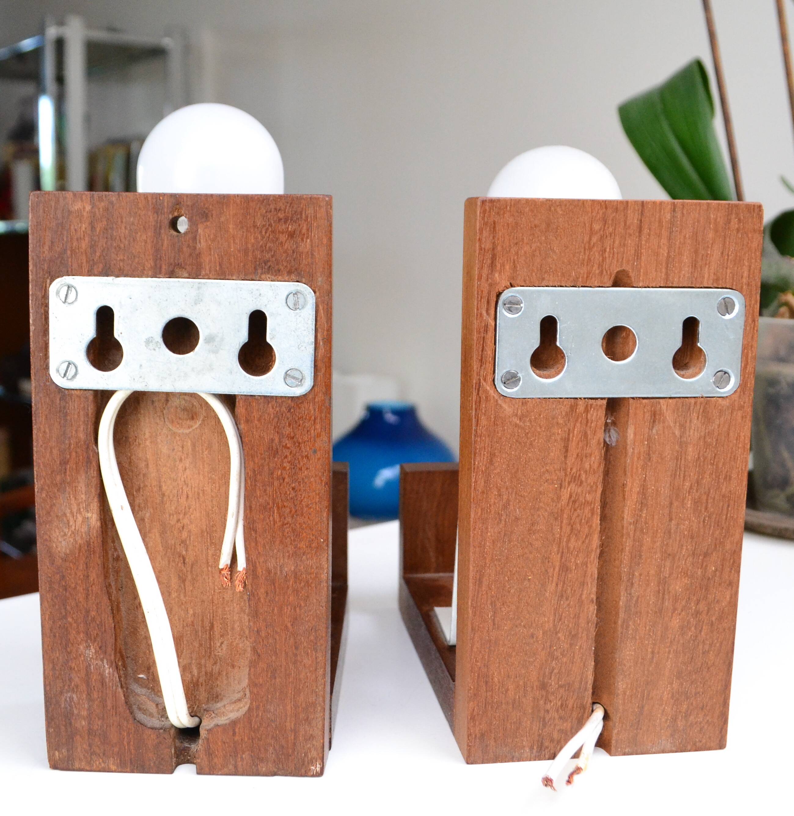 Pair of Louis Kalff opaline and teak wall lights from the 1950s/60s
