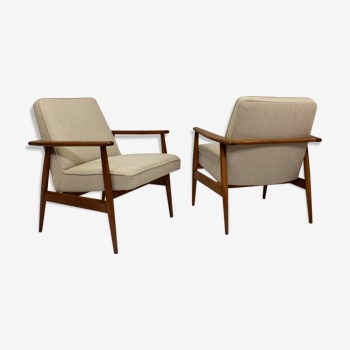 A pair of armchairs designed by Mr. Zieliski in the 60