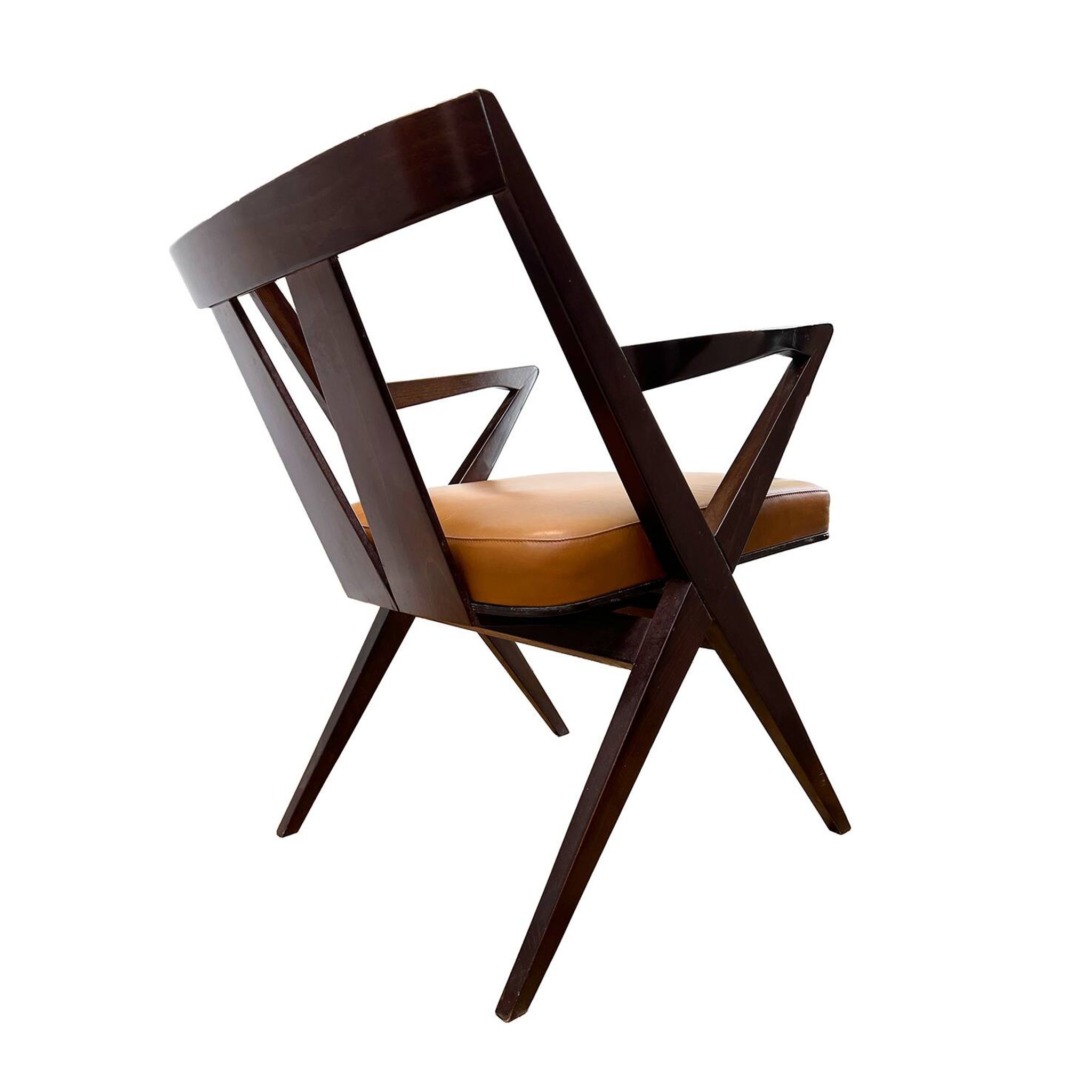 4 Dining chairs inspired by Pierre Jeanneret style, made of solid wood and leather.