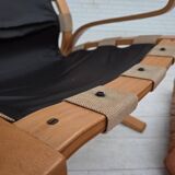 Fauteuil norvégien des années 1970, modèle "Kengu", cuir de meuble.