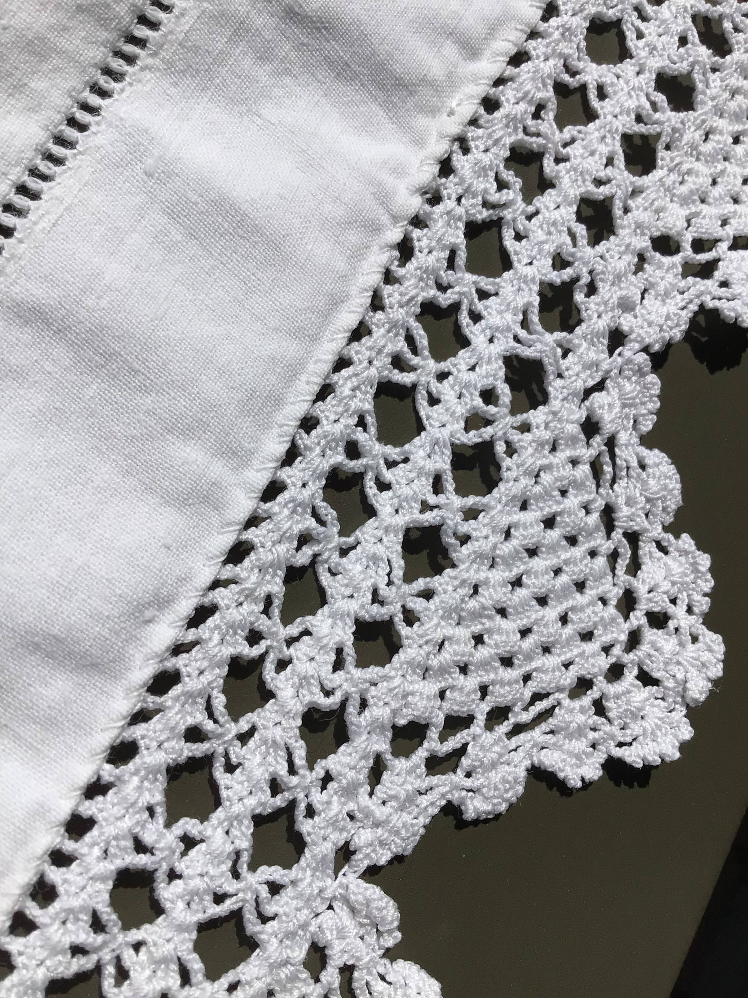 MC embroidered pillowcase with flower detailing and crocheted edge