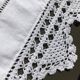 MC embroidered pillowcase with flower detailing and crocheted edge