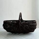 Dark wicker basket, mushroom basket.