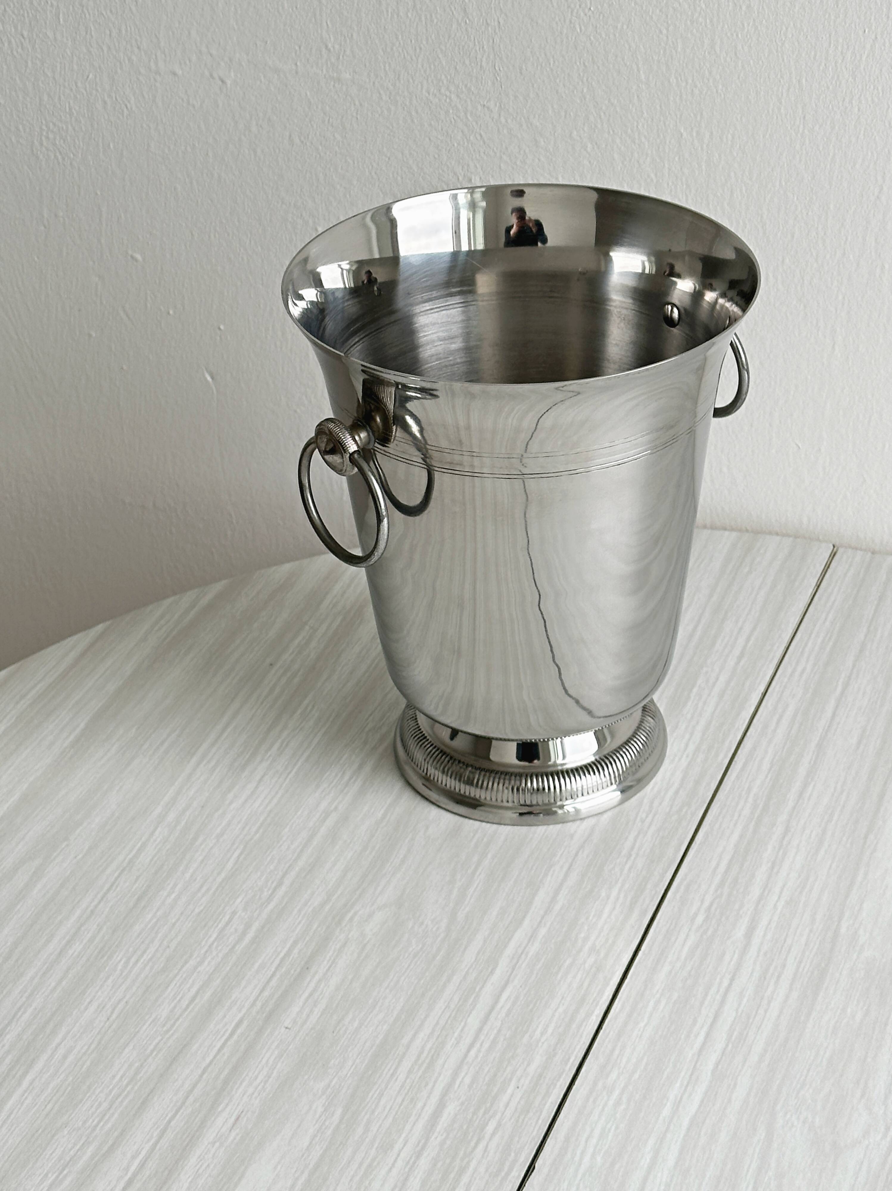 Shiny metal champagne bucket