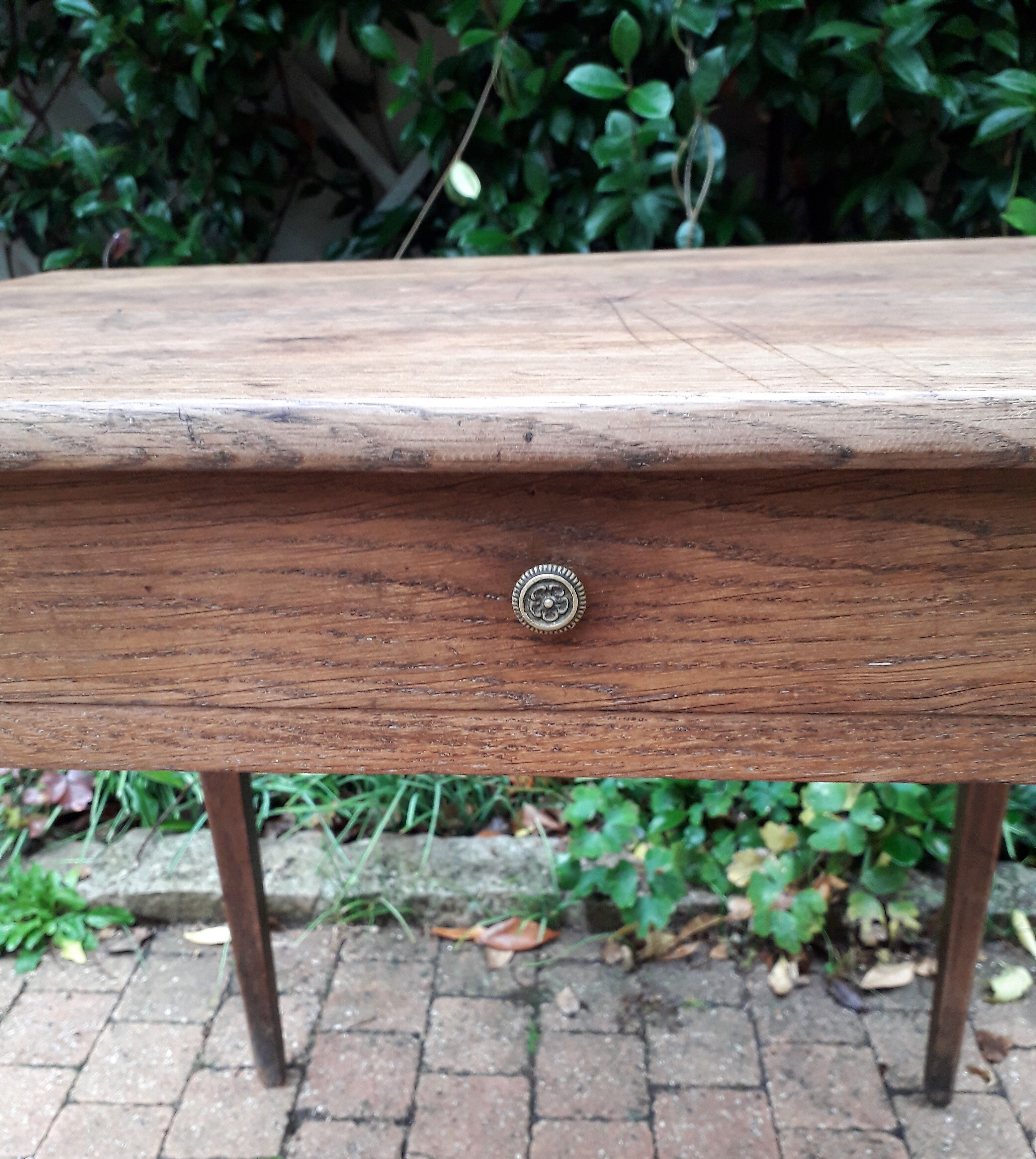 Old end table in oak