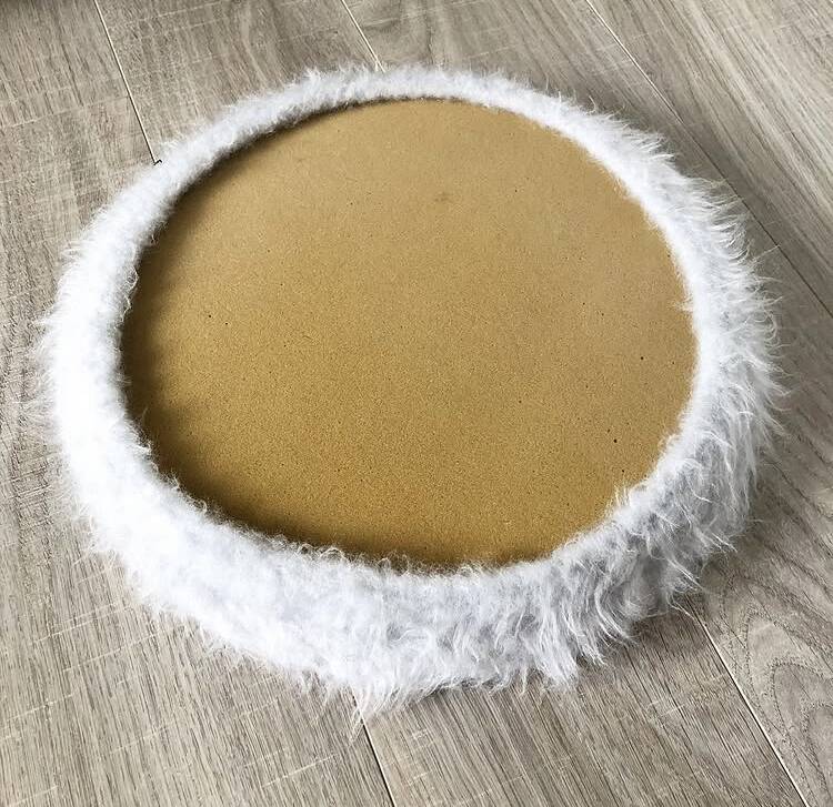 Vintage brass pouf with fur.