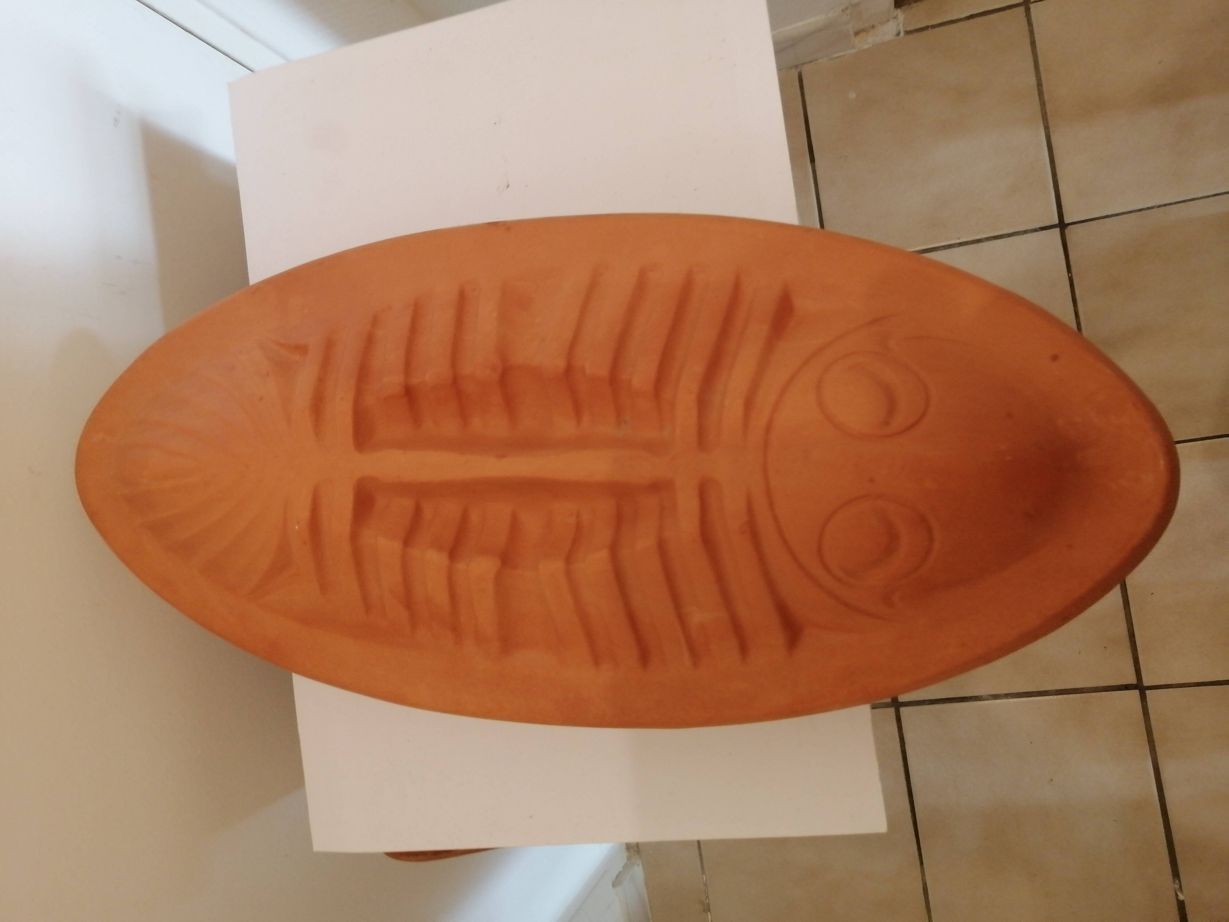 Fish shaped terracotta cooking dish