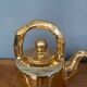Golden ceramic teapot, model "Charlotte" by Kühn Keramik.