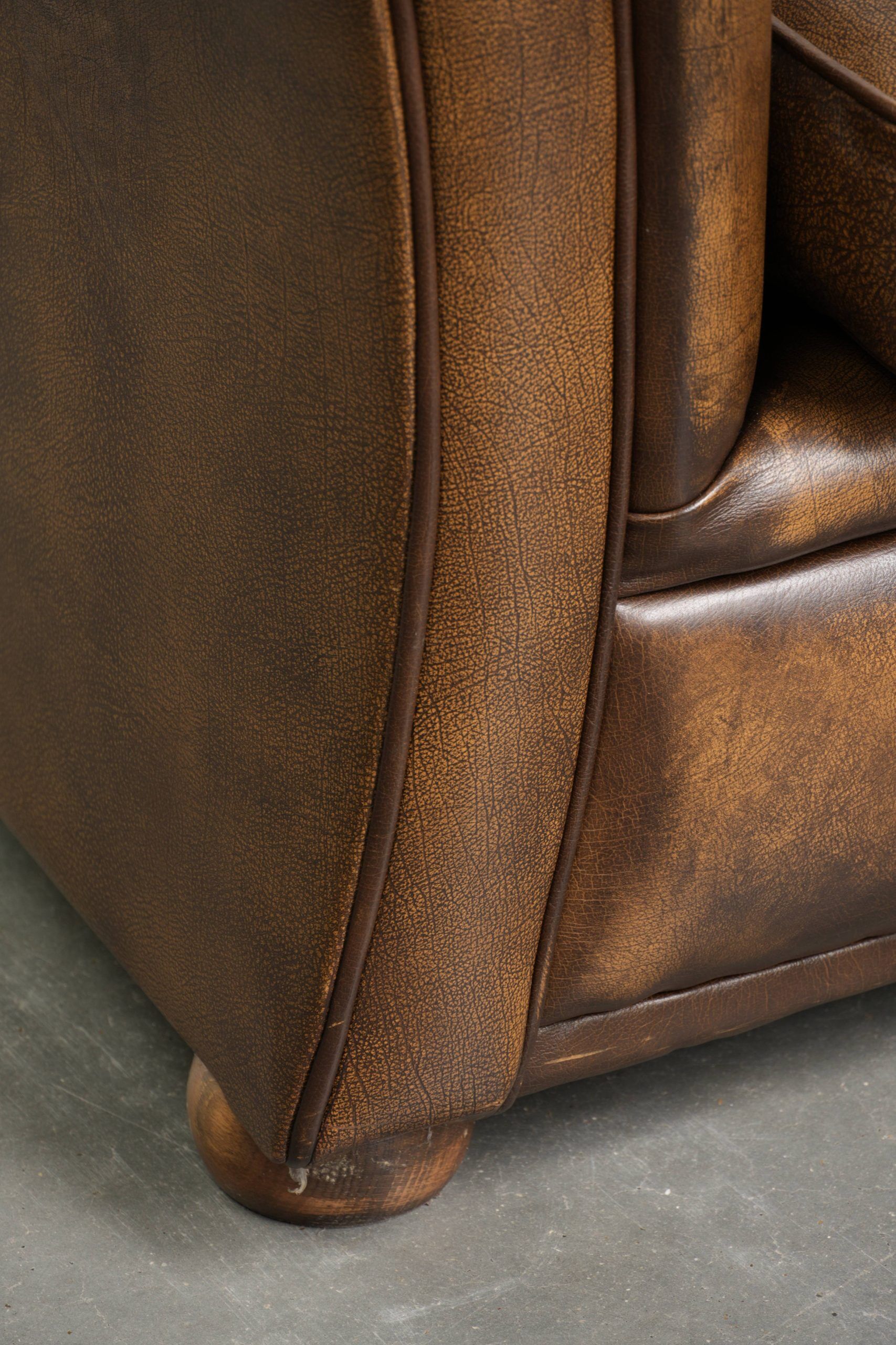 English cowhide leather Chesterfield 2-seater sofa in a luxurious colour