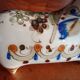 Ken edwards pottery - stylized horse decorated with butterfly flowers bird
