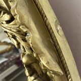 Miroir ancien ovale doré – style Louis XVI avec nœud ruban