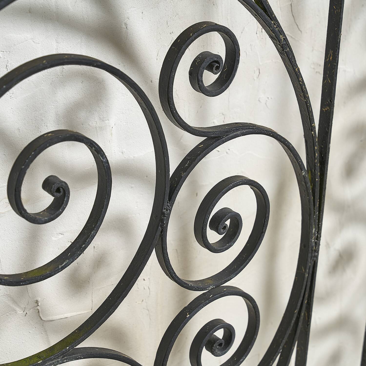 Arched wrought iron gate